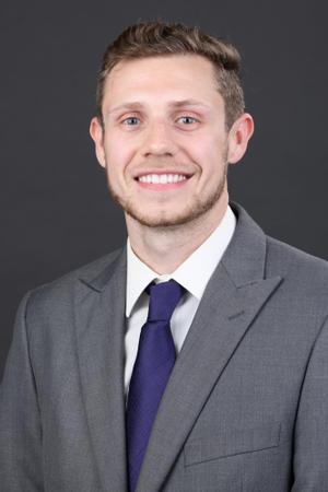 Director of Volleyball Operations Cody Carmichael